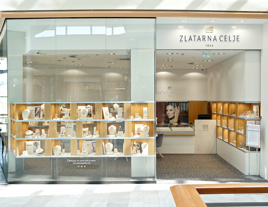 A jewelry store display featuring elegant pieces, with a modern interior and a welcoming atmosphere.